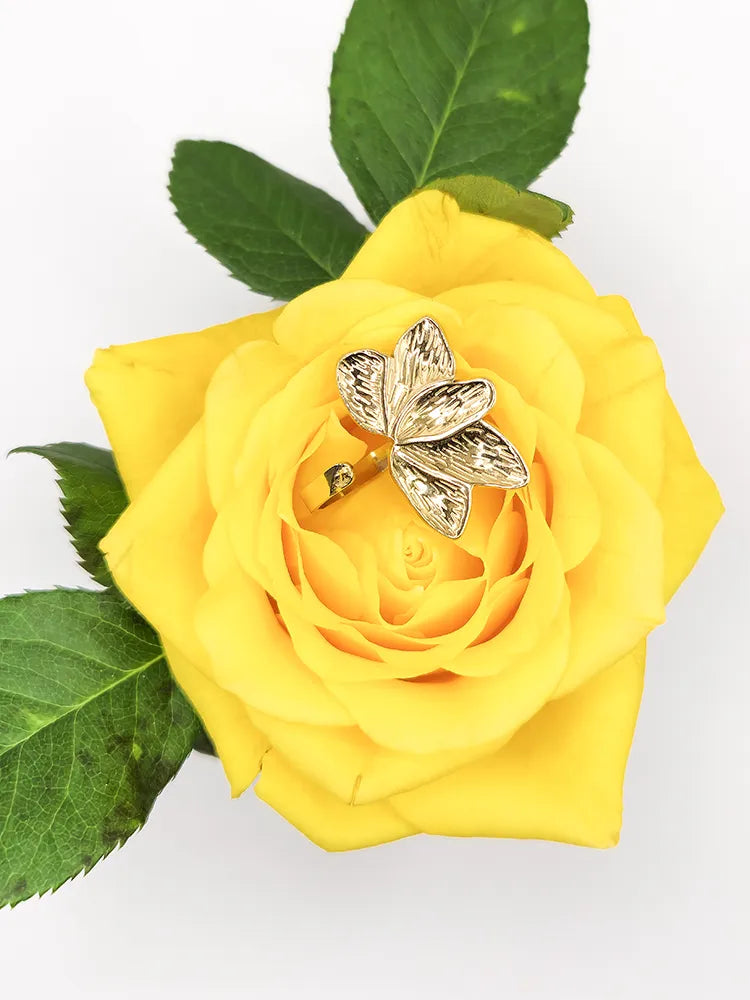 Bague demi-fleur dorée ajustable acier inoxydable