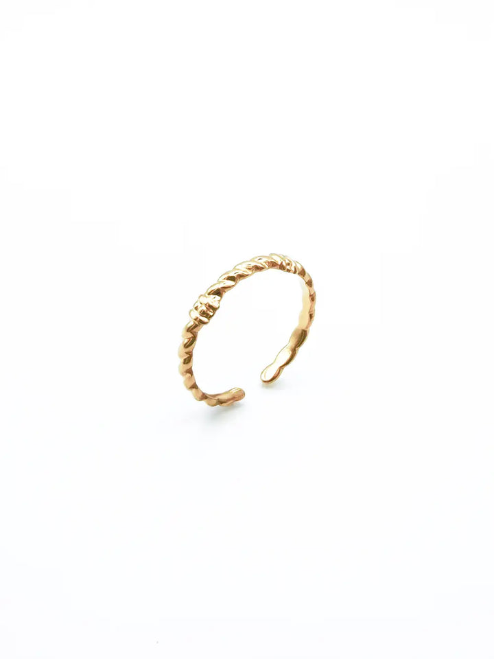 Bague fine femme torsadée à nœuds en acier inoxydable doré