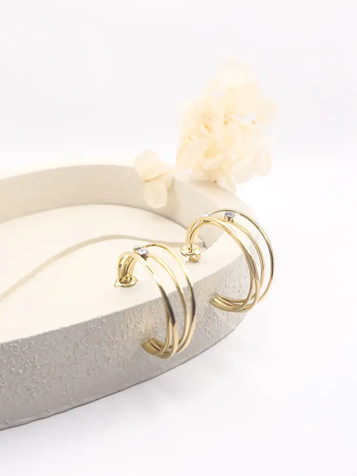 Boucles d’oreilles créoles dorées multi fils avec cristaux