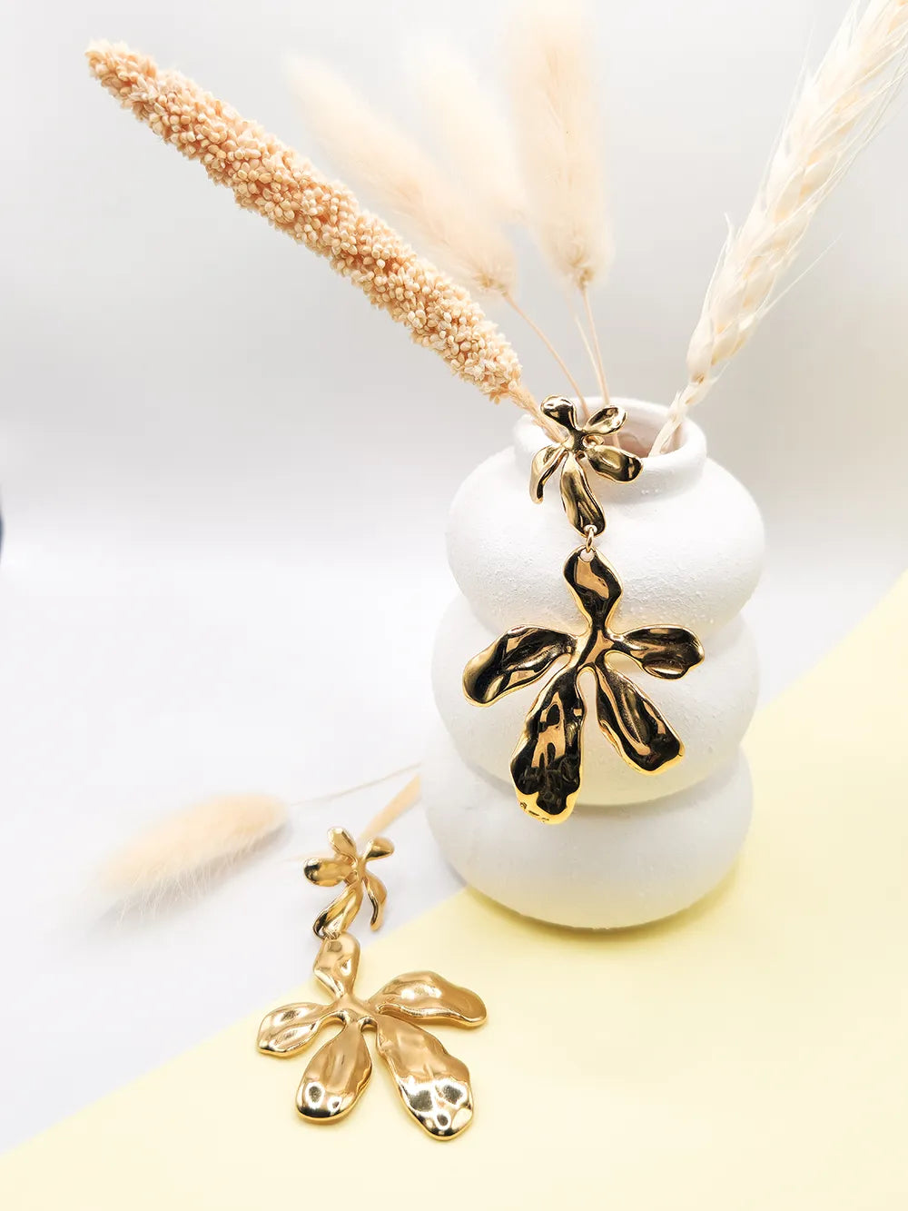 Boucles fleurs acier inoxydable doré