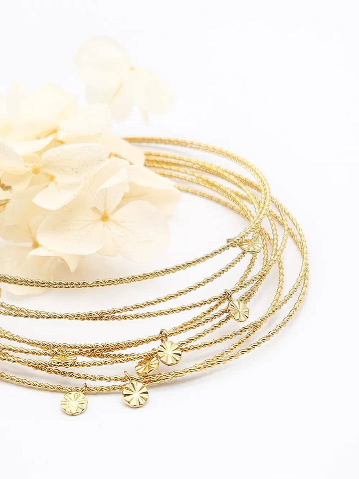 Bracelet femme doré joncs tressés et pampilles étoile