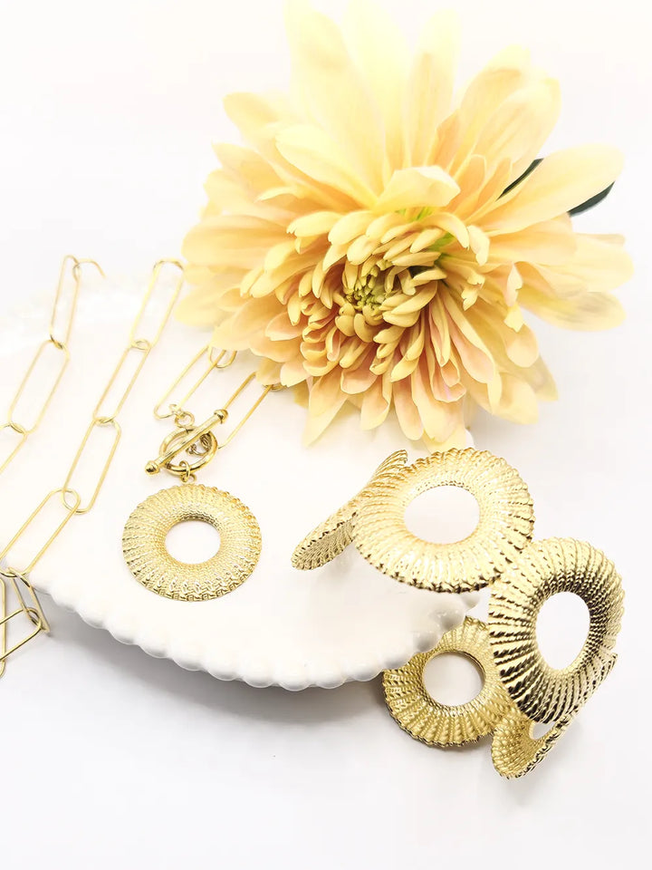 collection bijoux dorées en acier inoxydable motif coquillage