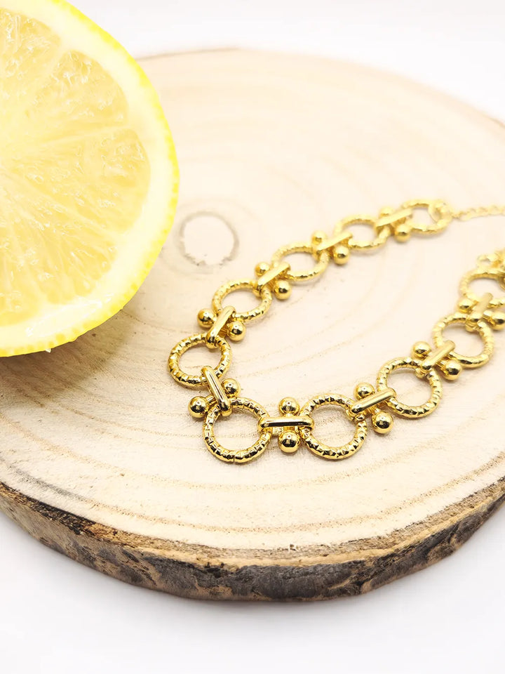 Bracelet doré grosses mailles rondes martelées