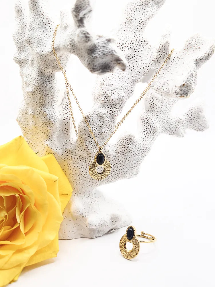 Collier et bague femme acier inoxydable doré avec pierre noire