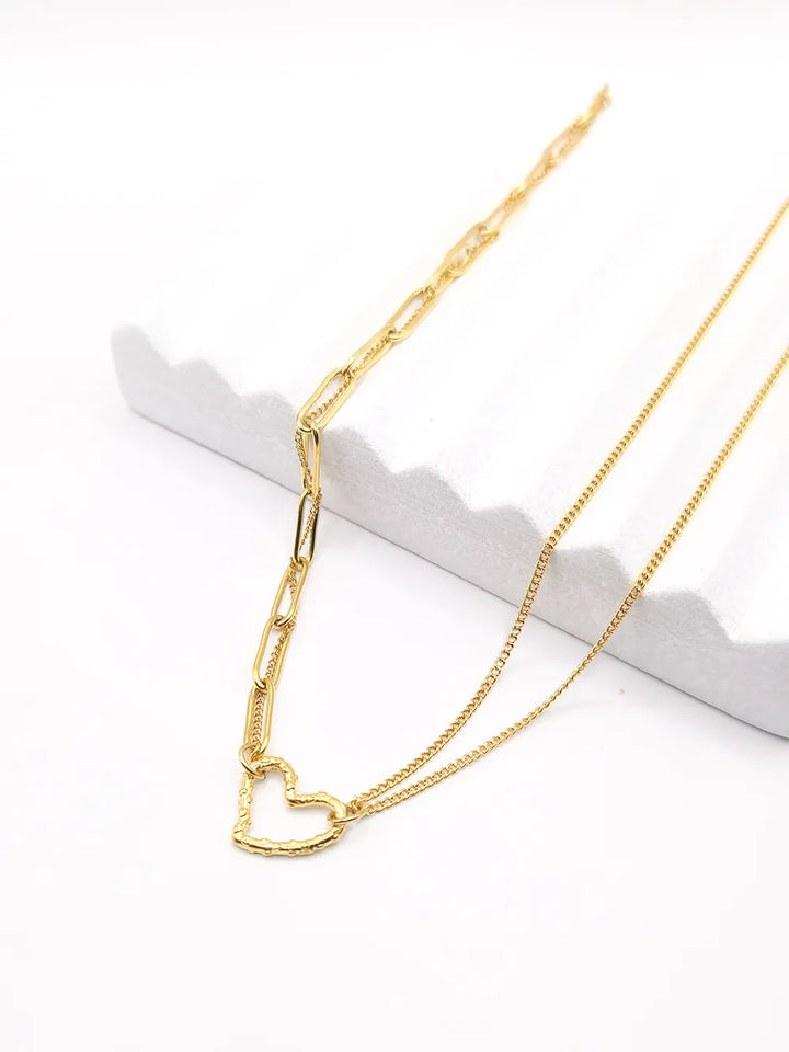 Bijou fantaisie cœur martelé en acier inoxydable doré