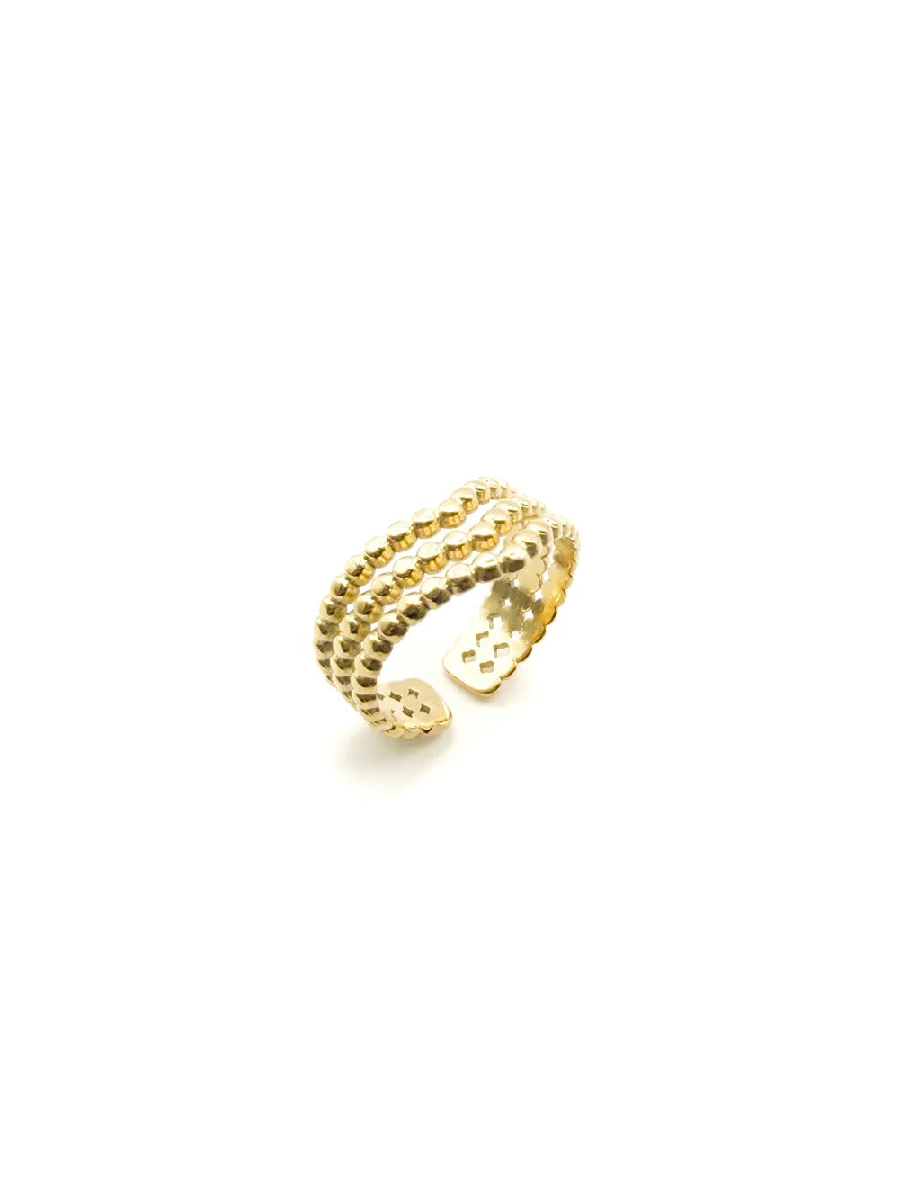 détail bague large perlée dorée design V tendance