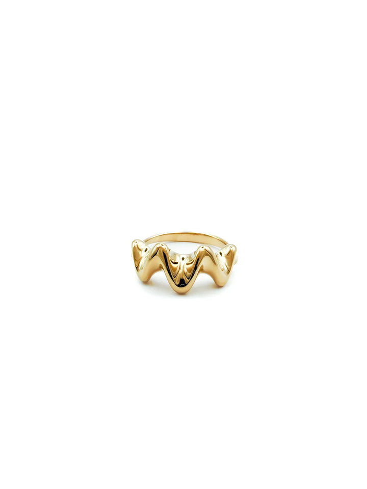 bague femme dorée design vague tendance