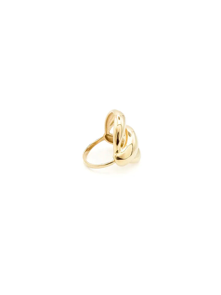 Bague dorée volumineuse aux formes arrondies