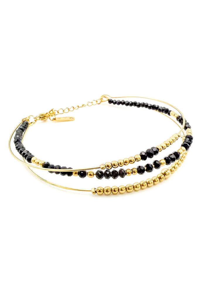 Bracelet triple jonc doré perles noires – Acier inoxydable