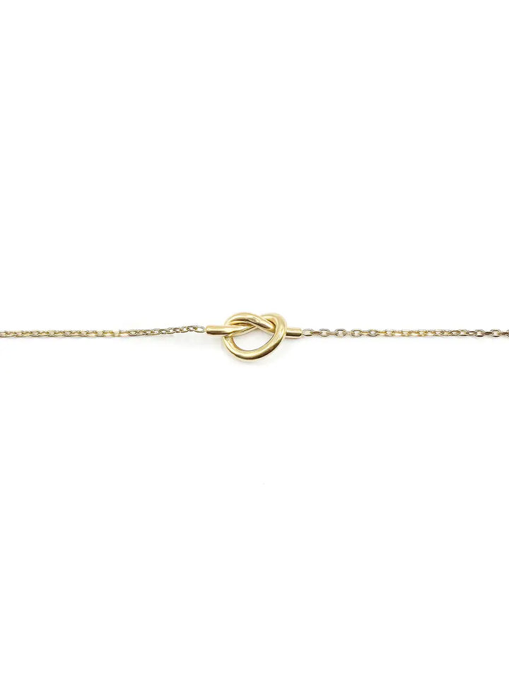 Bracelet fin nœud doré en acier inoxydable