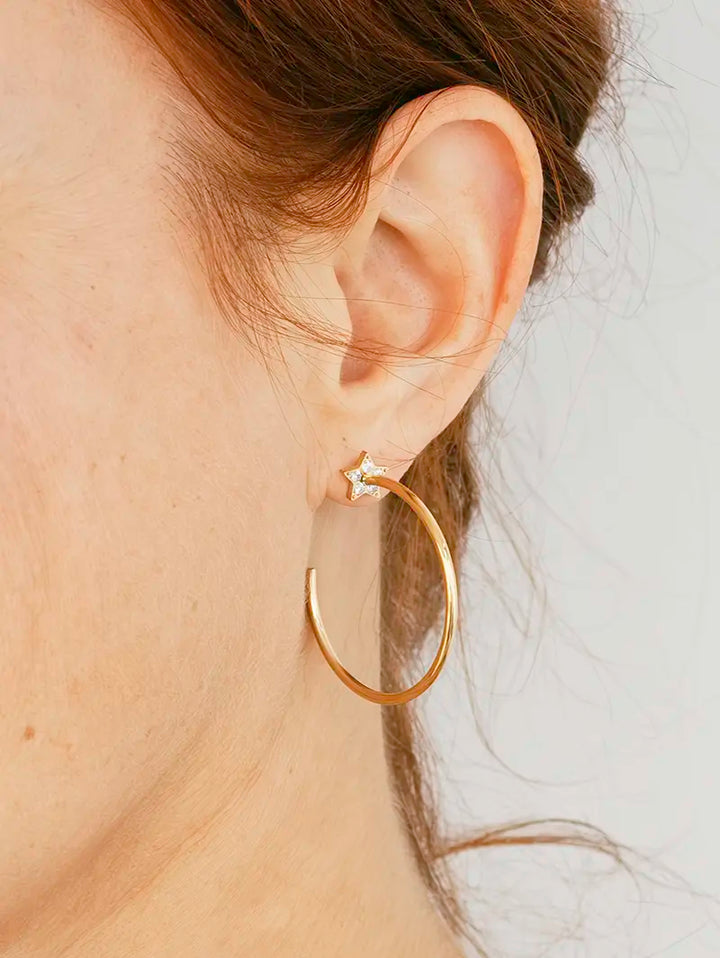 créoles dorées avec étoile strass